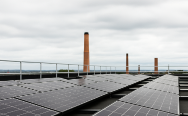 Solar Panels on Rooftop Under Overcast Sky